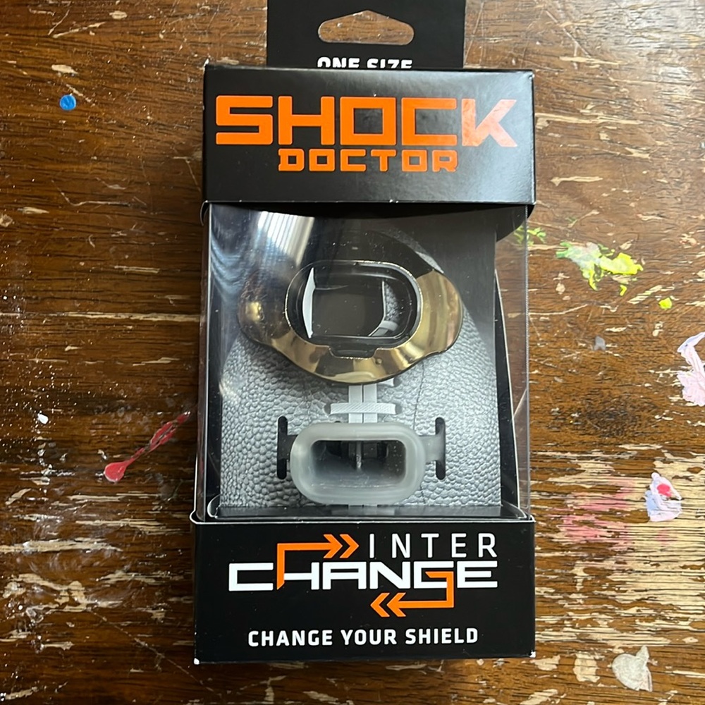 Shock dock lip guard protection for sports
